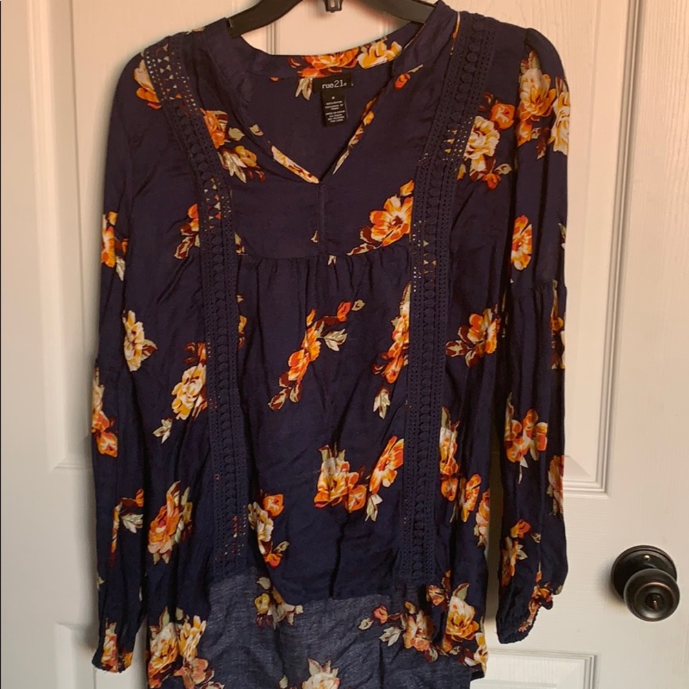 Blue top with orange and white flowers